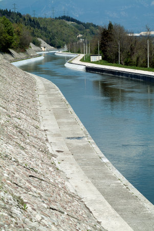 Vertical framing of Artificial river channel in concreteの写真素材