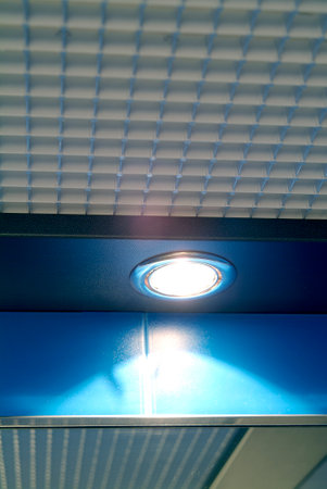 Detail of lift car ceiling with lighted lampの写真素材