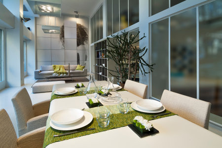 Table set in a modern setting with runnerの写真素材