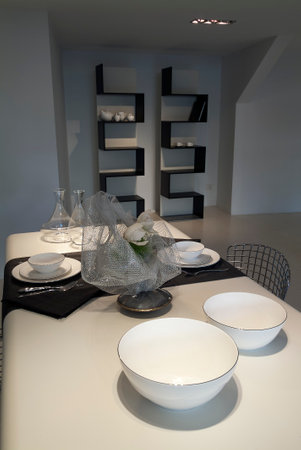 Table set in a modern setting with runnerの写真素材