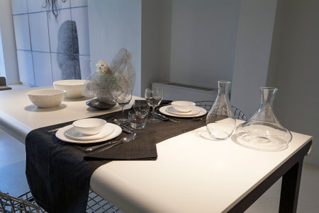 Table set in a modern setting with runnerの写真素材