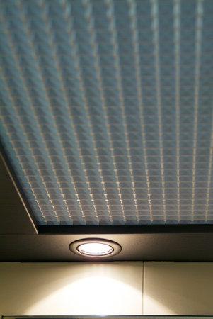 Detail of lift car ceiling with lighted lampの写真素材