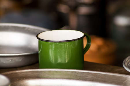 The composition of the metal circle near the beautiful platesの写真素材