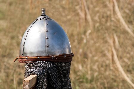 hanging single set of chain mail helmet from the Middle Ages