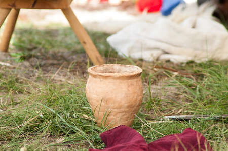 clay pot on the ground during historical festivalの写真素材