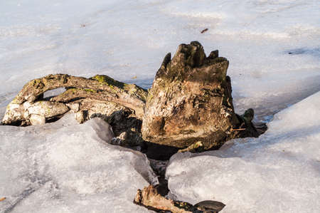 river, winter, snow on a foggy dayの写真素材