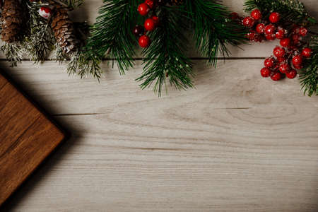 Festive Christmas and new year card on wooden background