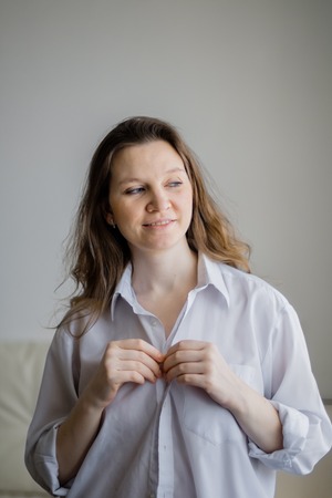 Young mother with a baby in her arms. Without clothing. life styleの写真素材