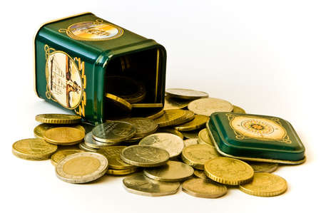 Various coins in a green tinの写真素材