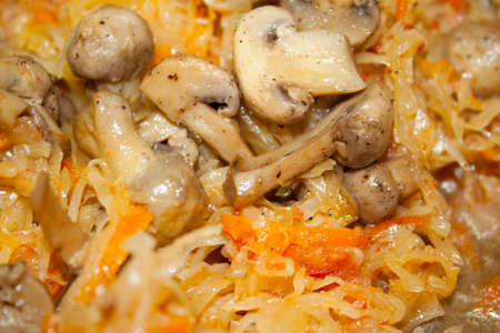 Tasty and beautiful fried cabbage with mushrooms.の写真素材
