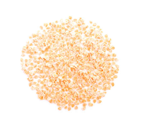 Small pile of tomato seeds isolated on white background.の写真素材