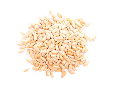 Small pile of sunflower seeds isolated on white background.の写真素材