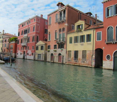 Tripping by the Venetian channels in autumn の写真素材