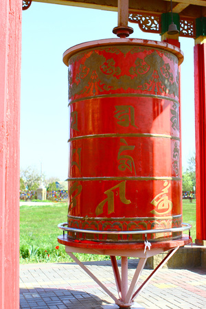 Photo of the Red prayer drums in a Buddhist temple.の写真素材