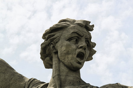 Head of female statue with open mouth on the sky backgroundのeditorial素材