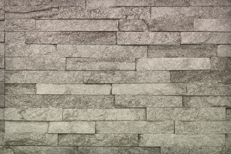 creative shabby red natural quartzite stone bricks texture for background use.