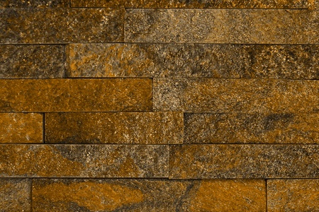nice shabby orange natural quartzite stone bricks texture for design purposes.