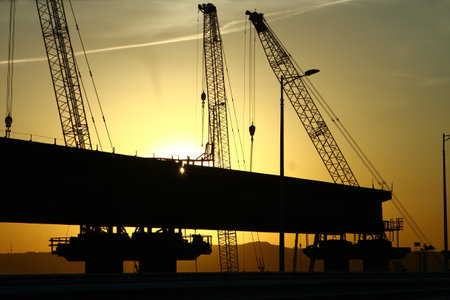 RUSSIA, CRIMEA BRIDGE - MAY 26, 2018: construction of railroad part of Crimea Bridge on sunset, industrial transportation image. illustrative editorialのeditorial素材