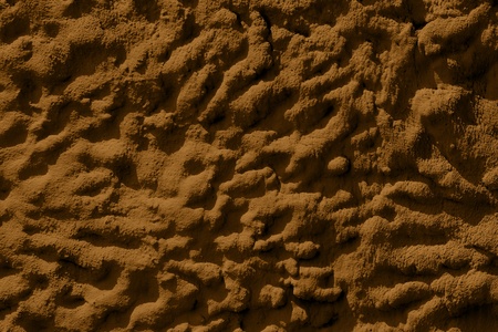 Blank orange grunge background of rough plaster that can be used as texture or background