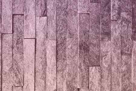 beautiful grunge red natural quartzite stone bricks texture for use as background.