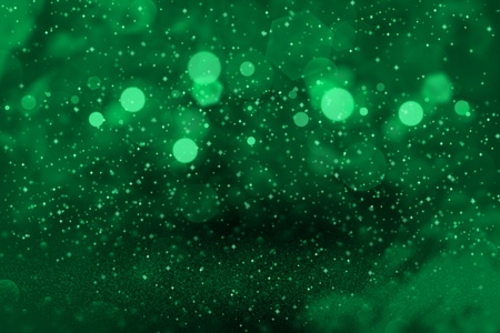 teal, sea-green fantastic sparkling abstract background glitter lights with sparks fly defocused...
