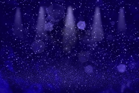 blue cute glossy abstract background stage spotlights with sparks fly defocused bokeh - festive mockup texture with blank space for your contentの写真素材