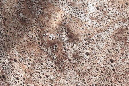fantastic aged coffee foam texture - abstract photo backgroundの写真素材