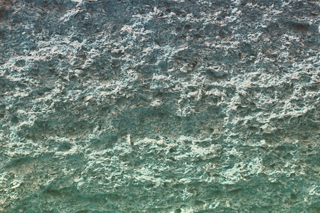Pretty light blue natural weathered rock close-up texture - abstract photo background