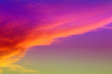 Marvellous colorful sun colored clouds in the sky for using as background in design.
