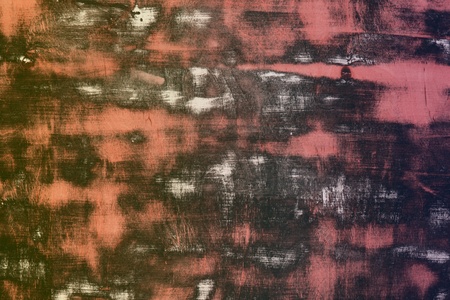 Cute red creative texture of wooden floor with different big cleared spots - abstract photo...