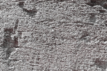 fantastic red natural scratched rock closeup texture - abstract photo background