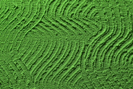 cute green grunge curved paint on wall texture - abstract photo backgroundの写真素材