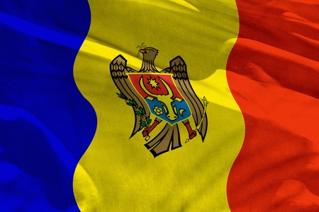 Fluttering Moldova flag for using as texture or background, the flag is waving on the wind