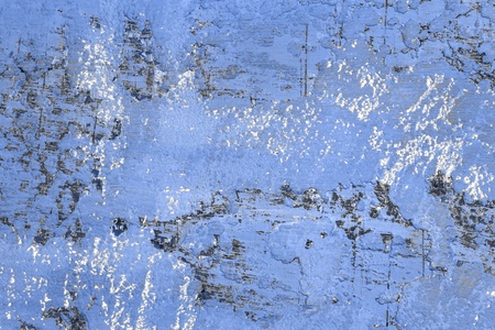 beautiful blue large holes on messy stucco texture - abstract photo backgroundの写真素材
