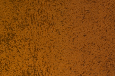 abstract old orange rough painted metallic surface texture for use as background.