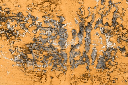 nice orange huge holes on shabby stucco texture - abstract photo background