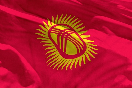 Fluttering Kyrgyzstan flag for using as texture or background, the flag is waving on the windの写真素材