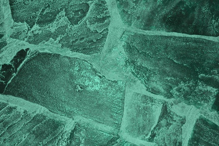 nice teal, sea-green rough boulder masonry texture - abstract photo backgroundの写真素材