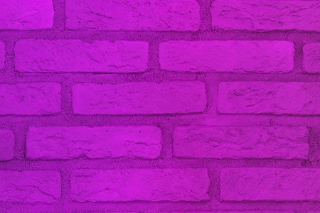creative old pink brick wall texture for background use.の写真素材