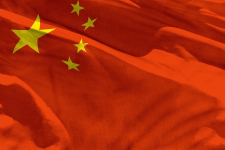 Fluttering China flag for using as texture or background, the flag is waving on the windの写真素材