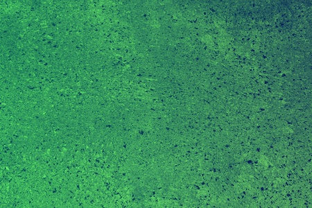 cute green dotted rough cover on the desk texture - abstract photo backgroundの写真素材