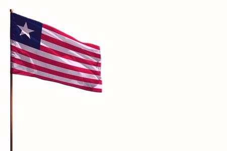 Fluttering Liberia flag isolated, mockup with the place for your text on white background.の写真素材