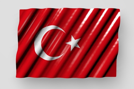 nice shiny flag of Turkey with large folds lying isolated on grey - any feast flag 3d illustration