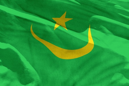 Fluttering Mauritania flag for using as texture or background, the flag is waving on the windの写真素材