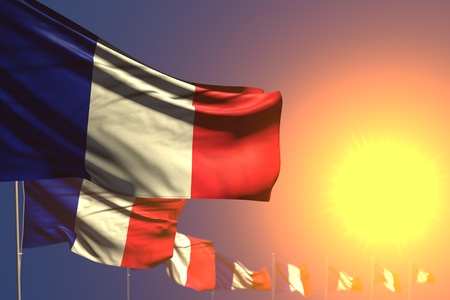 beautiful many France flags on sunset placed diagonal with soft focus and space for text - any holiday flag 3d illustrationの写真素材