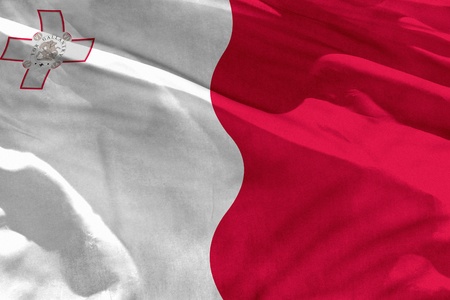 Fluttering Malta flag for using as texture or background, the flag is waving on the windの写真素材