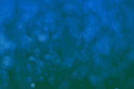 nice blue lots of flying festal sparkles bokeh texture - abstract photo background