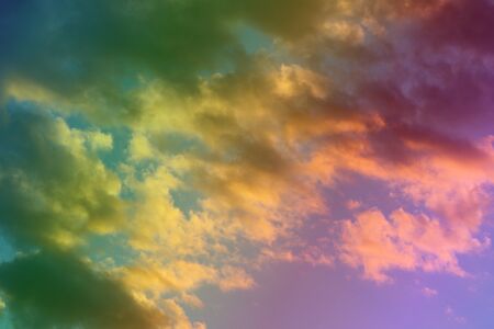 nice bright sun colored clouds on the sky for using as background in design.の写真素材