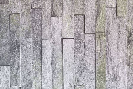 design vintage natural quartzite stone bricks texture for use as background.の写真素材