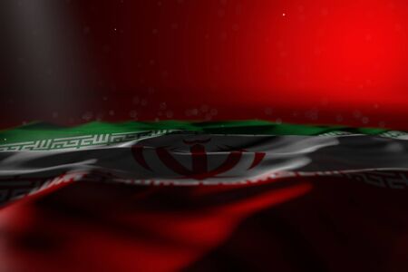 pretty labor day flag 3d illustration - dark picture of Iran flag lying on red background with selective focus and empty place for textの写真素材
